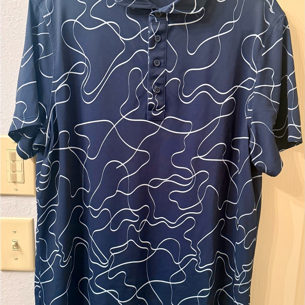 Stylish Navy Blue Polo Shirt with Abstract Design